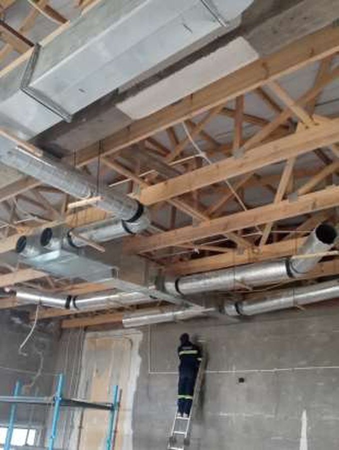 Ducted ventilation installation in progress